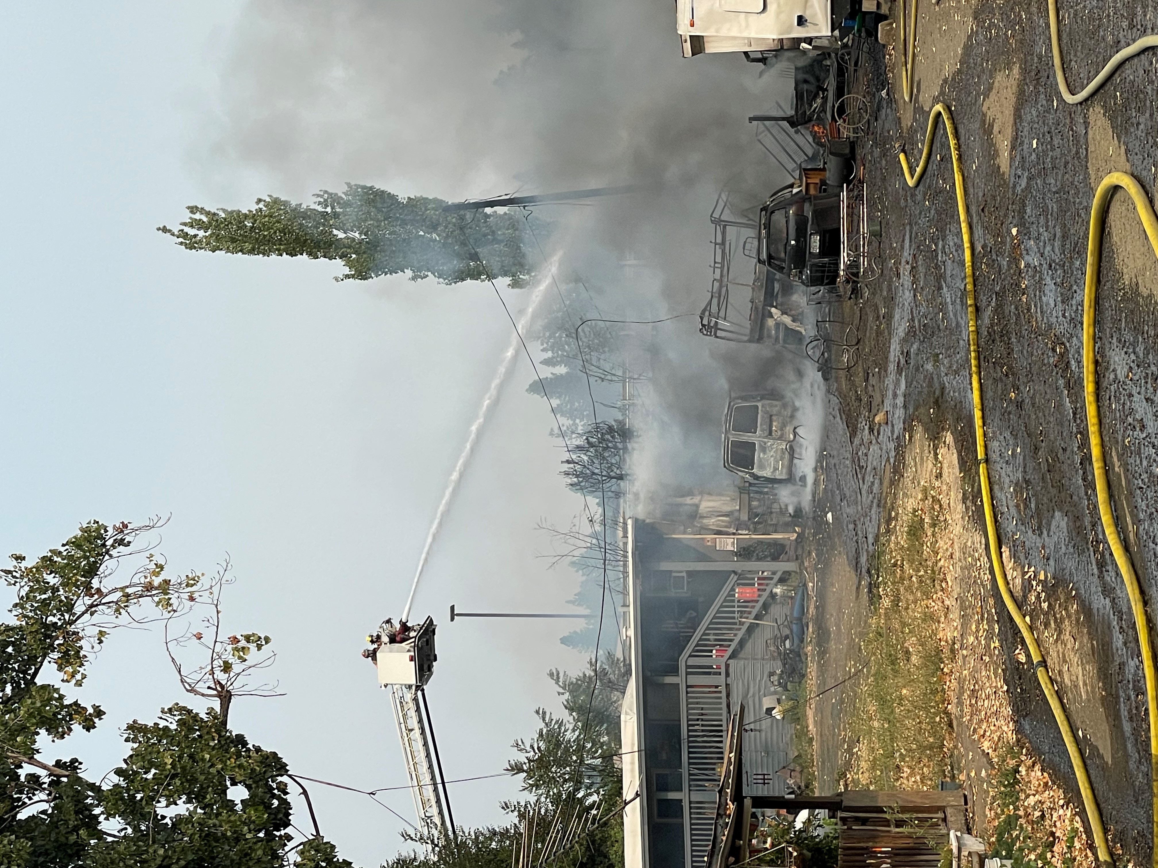 Recreational Vehicle Fire with Multiple Exposures -- 1713 SE Mill Street -- 8-21-23 (Photo) featured image